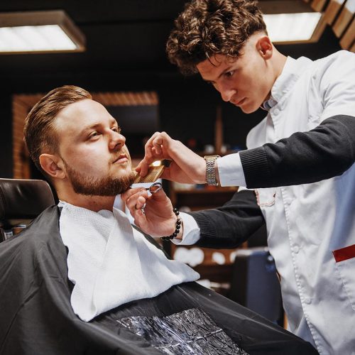 mens-hairstyling-and-haircutting-in-a-barber-shop-T8K7HL5.jpg